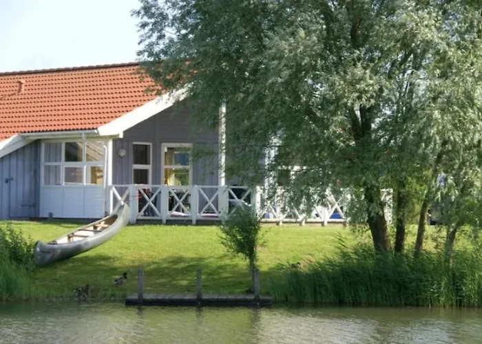 6 Personen Mit Privatem Bootsteg, Direkter Seelage, Kanu, Whirlpool Und Sauna In Ferienhaus Otterndorf